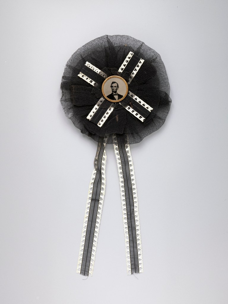 Unknown maker (American); Photography Studio: After, Brady & Co., American, active 1840s - 1880s '[Mourning Corsage with Portrait of Abraham Lincoln]' (detail) Photograph, corsage April 1865