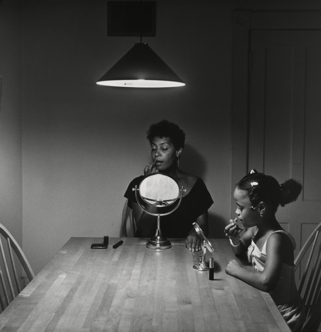 Carrie Mae Weems (American, b. 1953) 'Untitled (Woman and daughter with makeup)' (from 'Kitchen Table Series') 1990