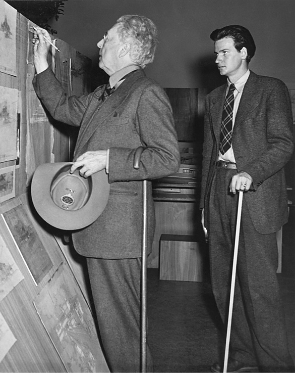 Frank Lloyd Wright and his assistant Eugene Masselink installing the exhibition 'Frank Lloyd Wright: American Architect' at The Museum of Modern Art, November 13, 1940-January 5, 1941