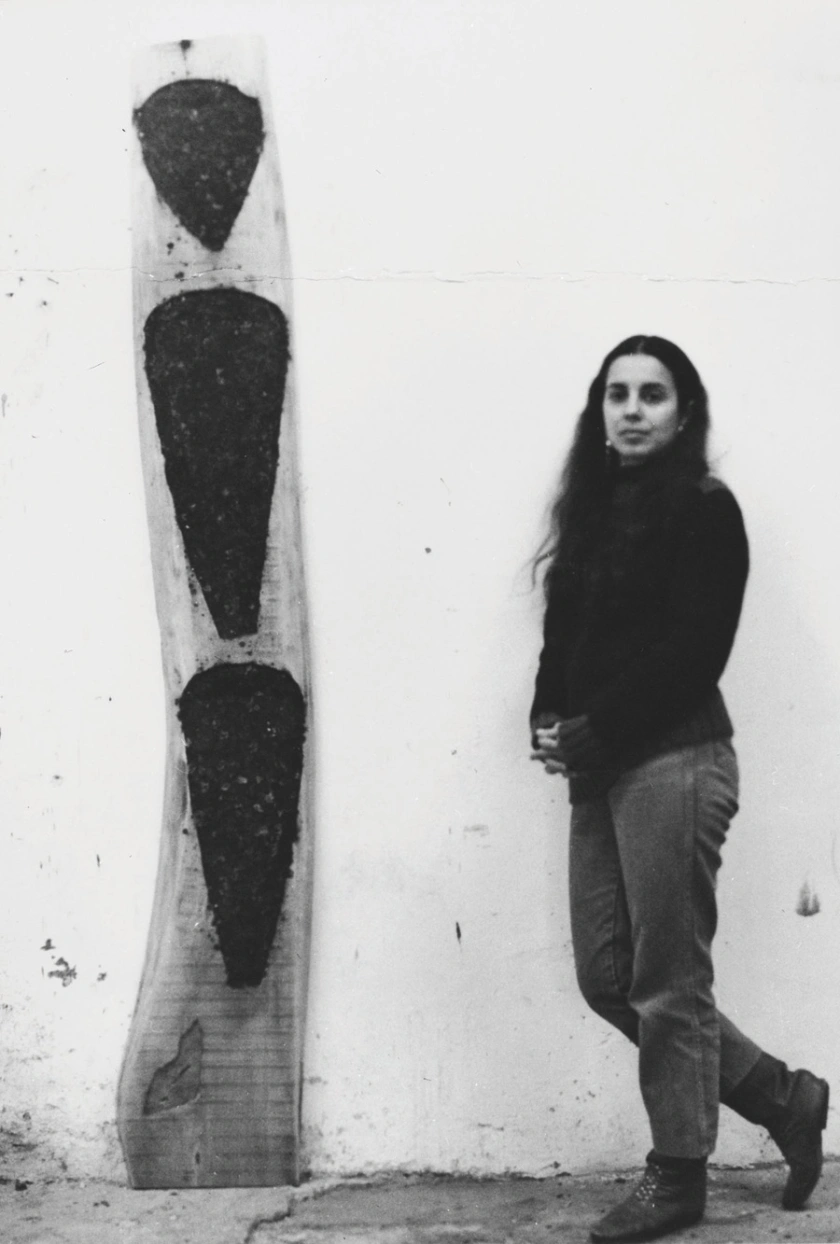 Ana Mendieta with Untitled wood sculpture, 1984-85