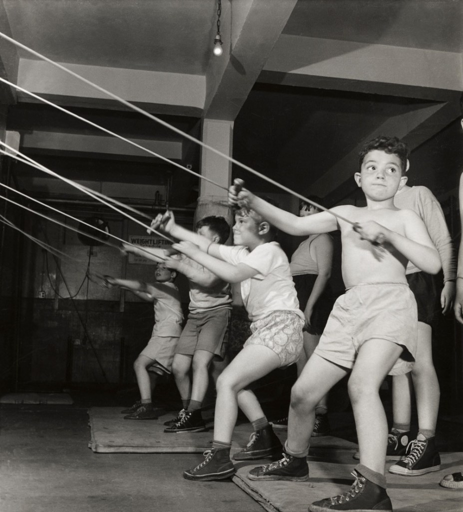 Roman Vishniac (Russian-American, 1897-1990) '[Boys exercising in the gymnasium of the Jewish Community House of Bensonhurst, Brooklyn]' 1949
