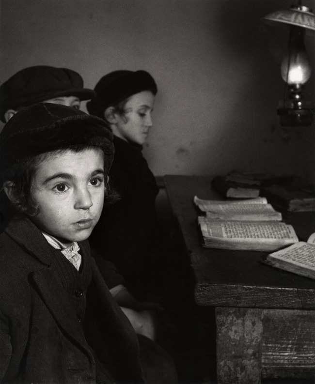 Roman Vishniac (1897-1990) '[David Eckstein, seven years old, and classmates in cheder (Jewish elementary school), Brod]' c. 1938