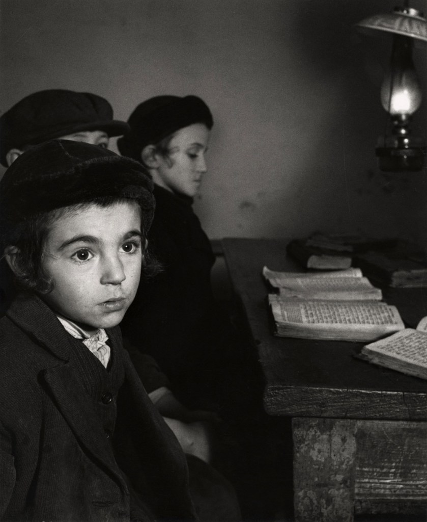 Roman Vishniac (America born Russia, 1897-1990) '[David Eckstein, seven years old, and classmates in cheder (Jewish elementary school), Brod]' c. 1938