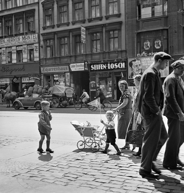 Roman Vishniac (Russian-American, 1897-1990) '[Street scene with a swastika flag on a storefront (at left), Berlin]' c. 1935-1936 (printed 2012)