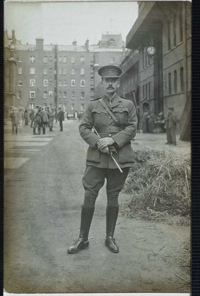 Christina Bloom (British, 1862-1939) 'A lieutenant from the 1st Life Guards poses for the camera in August 1914'