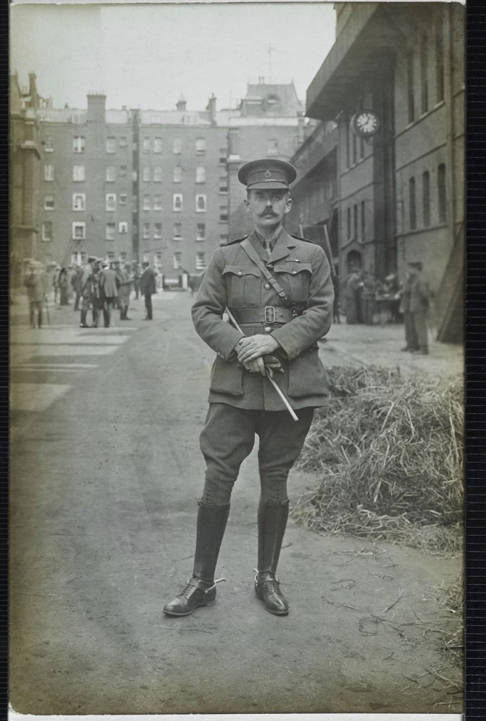 Christina Bloom (British, 1862-1939) 'A lieutenant from the 1st Life Guards poses for the camera in August 1914'