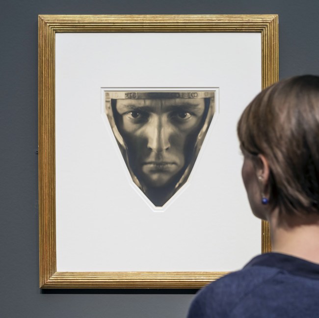 Rudolf Koppitz (Austrian, 1884-1936) 'Head of a Man with Helmet' c. 1929 (installation view)