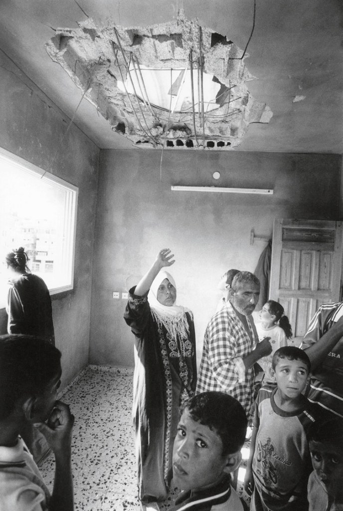 Jean Mohr (Swiss, 1925-2018) 'A needs assessment visit to stricken families, Khan Yunis, Gaza, 2002' Jean Mohr (Swiss, 1925-2018) 'A needs assessment visit to stricken families, Khan Yunis, Gaza, 2002'