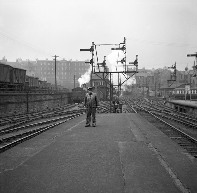 Anonymous photographer. 'Man on platform in front of signal array' mid-1950s to the early 1960s