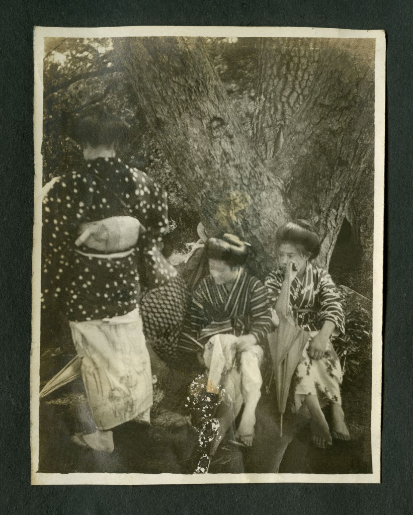 Anonymous photographer (Japanese). 'Untitled [Three women and an umbrella]' (restored) from a Japanese family photography album c. 1920-1930s