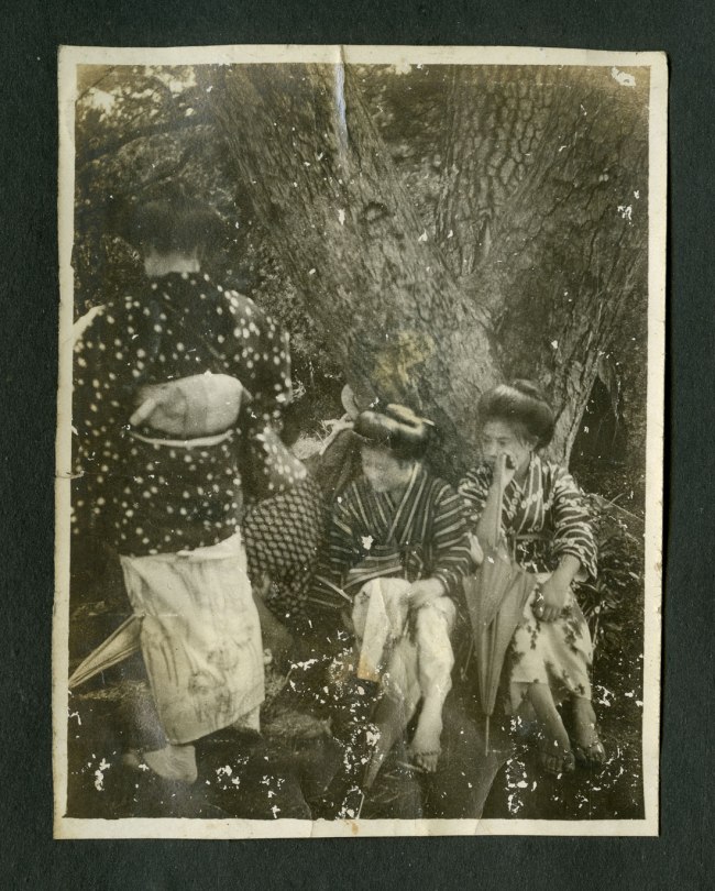 Anonymous photographer (Japanese). 'Untitled [Three women and an umbrella]' (umrestored) from a Japanese family photography album c. 1920-1930s