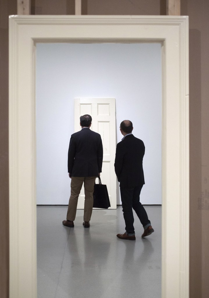 Installation view of 'Robert Gober: The Heart Is Not a Metaphor', The Museum of Modern Art, October 4, 2014 - January 18, 2015 showing Gober's 'Untitled Door and Door Frame' 1987-1988