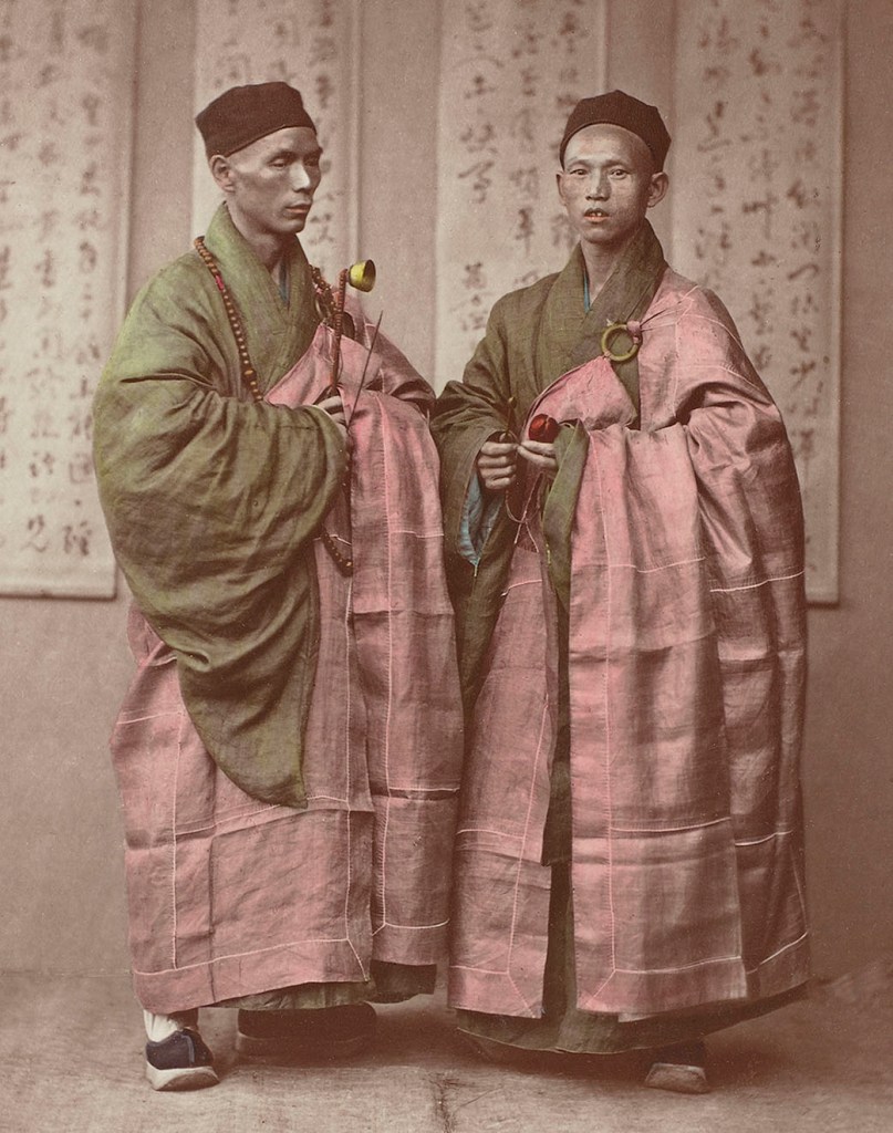 Attributed to Baron Raimund von Stillfried und Ratenitz (Austrian, 1839-1911) 'Portrait of two Chinese Buddhist monks with rosary, bell and slit drum' 1875 (detail)