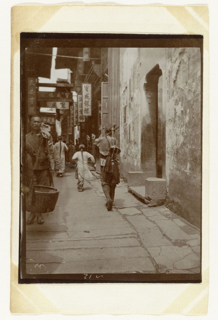 Attributed to Jan Adriani (Dutch, d. 1948) 'A street with several people in Kinkiang, China' 1907
