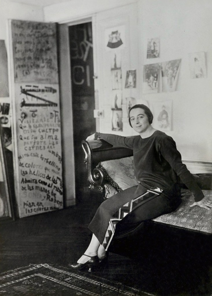 Unknown photographer. 'Sonia Delaunay in front of her door-poem in the Delaunays' apartment, Boulevard Malesherbes, Paris' 1924