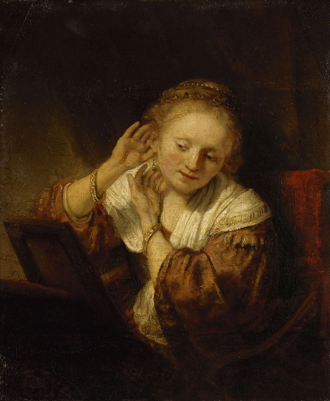 Rembrandt Harmensz. van Rijn (Dutch, 1606-69) 'Young woman trying on earrings' 1657
