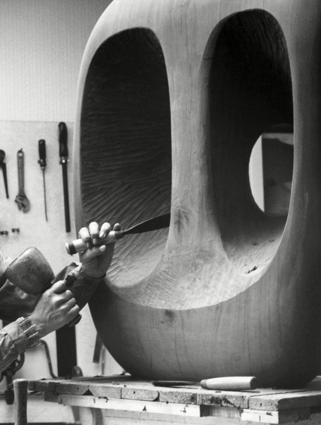 Val Wilmer (British, b. 1941) 'Barbara Hepworth in the Palais de la Danse studio, St Ives, at work on the wood carving Hollow Form with White Interior' 1963 (detail)