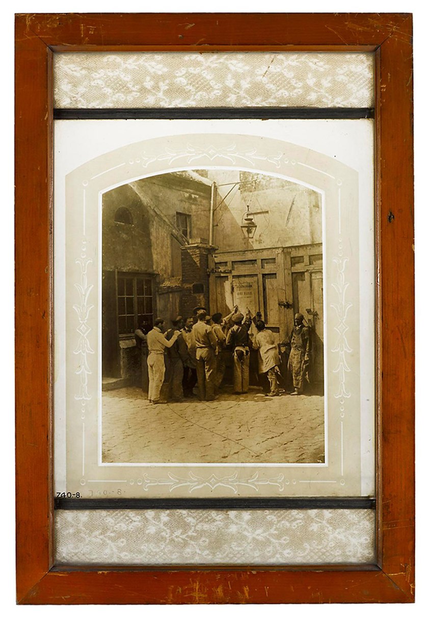 Photograph burnt in on glass, a group of workmen, Paris 1858