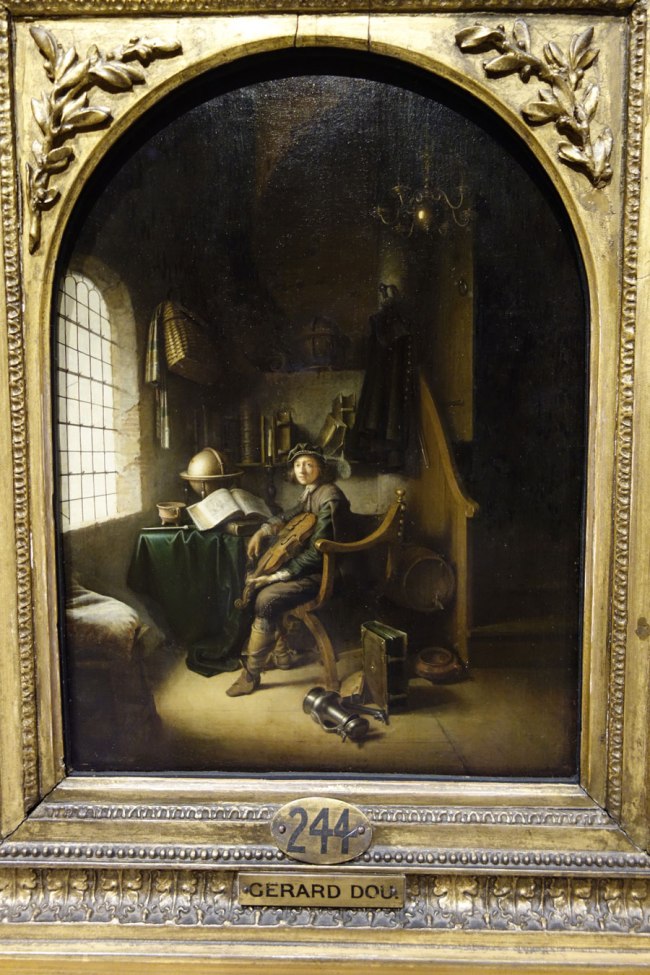 Gerrit Dou (The Netherlands, 1613-1675) 'An interior with a young viola player' 1637 (installation view)