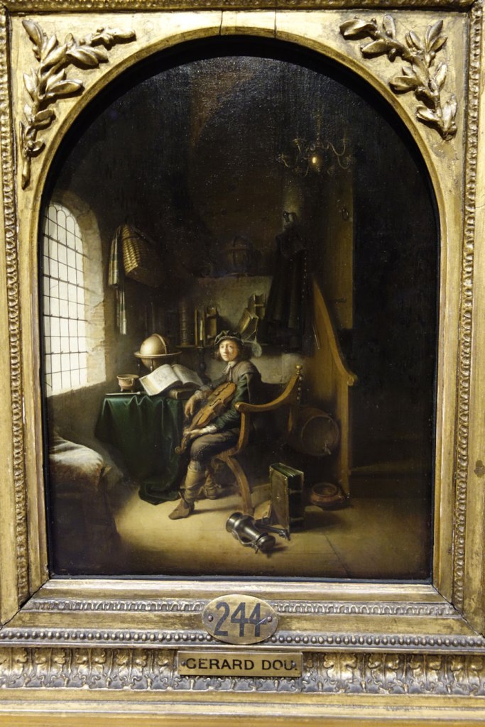 Gerrit Dou (The Netherlands, 1613-1675) 'An interior with a young viola player' 1637 (installation view)