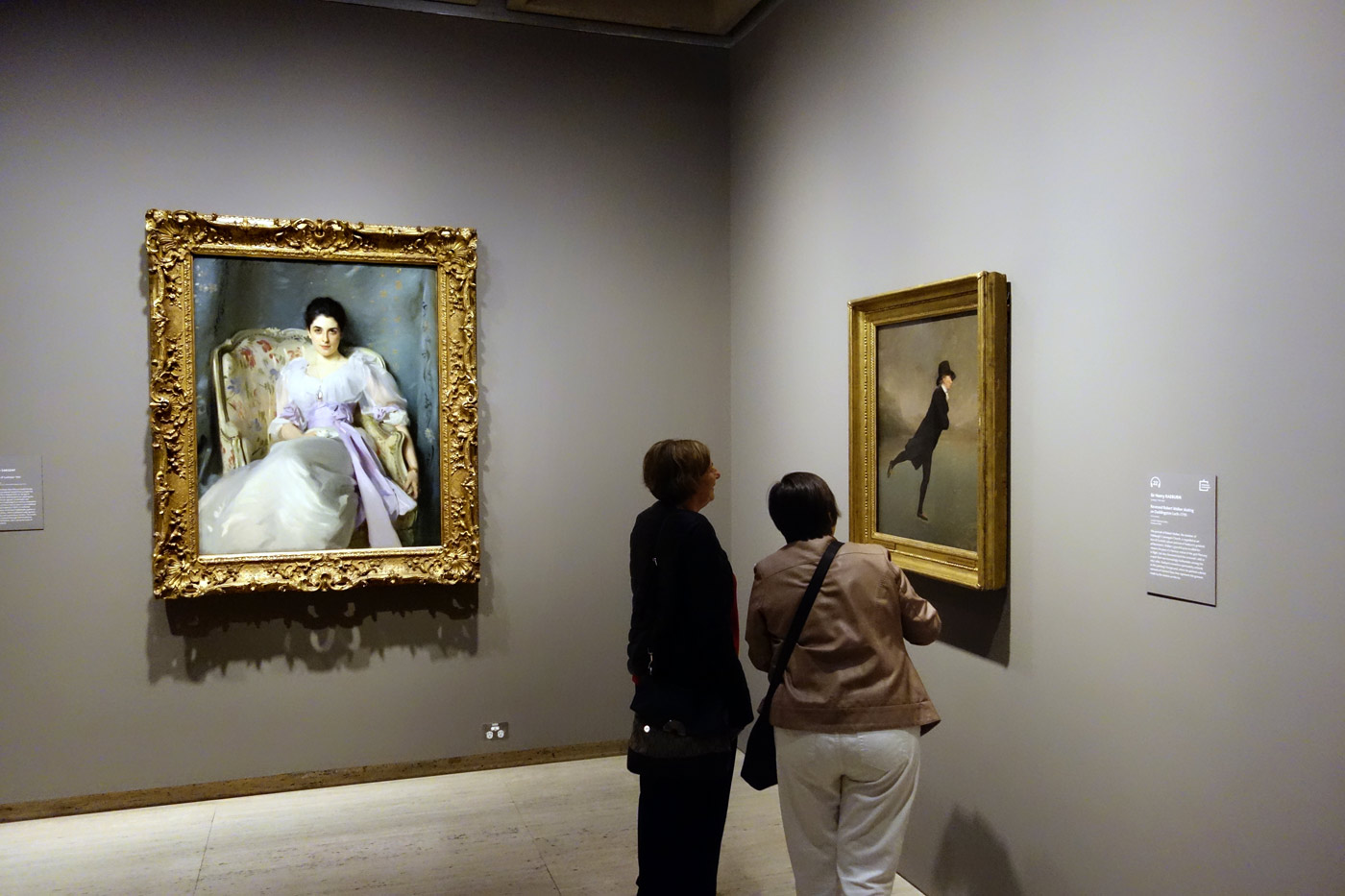 Installation view of the exhibition 'The Greats: Masterpieces from the National Galleries of Scotland' at the Art Gallery of New South Wales, Sydney with at left, John Singer Sargent's 'Lady Agnew of Lochnaw' (1892) and at right, Sir Henry Raeburn's 'Reverend Robert Walker skating on Duddingston Loch' (c. 1795) Installation view of the exhibition 'The Greats: Masterpieces from the National Galleries of Scotland' at the Art Gallery of New South Wales, Sydney with at left, John Singer Sargent's 'Lady Agnew of Lochnaw' (1892) and at right, Sir Henry Raeburn's 'Reverend Robert Walker skating on Duddingston Loch' (c. 1795)