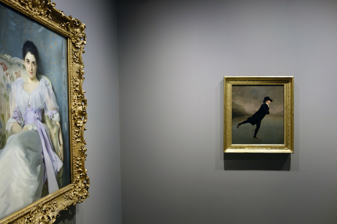 Installation view of the exhibition 'The Greats: Masterpieces from the National Galleries of Scotland' at the Art Gallery of New South Wales, Sydney with at left, John Singer Sargent's 'Lady Agnew of Lochnaw' (1892) and at right, Sir Henry Raeburn's 'Reverend Robert Walker skating on Duddingston Loch' (c. 1795) Installation view of the exhibition 'The Greats: Masterpieces from the National Galleries of Scotland' at the Art Gallery of New South Wales, Sydney with at left, John Singer Sargent's 'Lady Agnew of Lochnaw' (1892) and at right, Sir Henry Raeburn's 'Reverend Robert Walker skating on Duddingston Loch' (c. 1795)