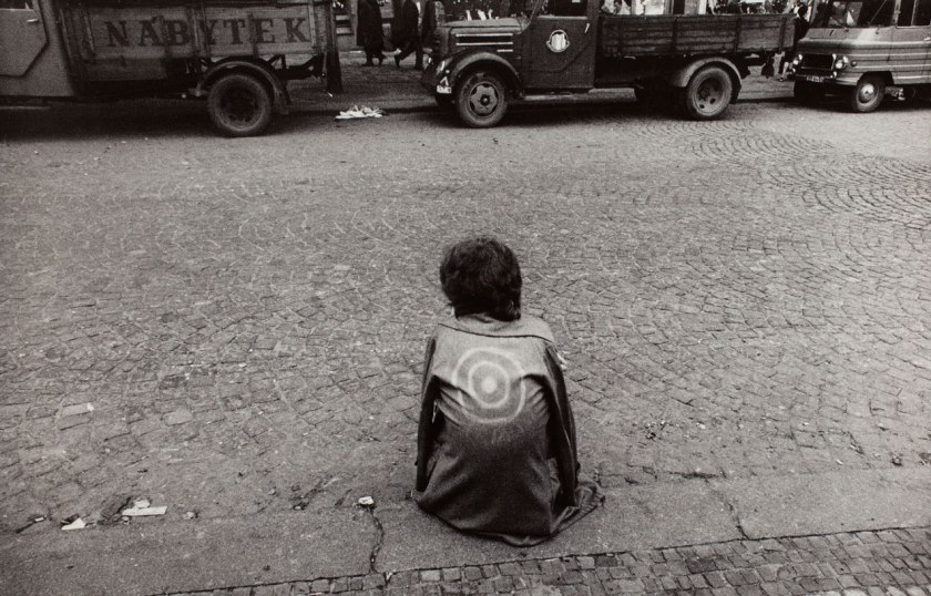 Josef Koudelka (Czech-French, b. 1938) '(Czech citizen on sidewalk, wearing jacket with target)' 1968