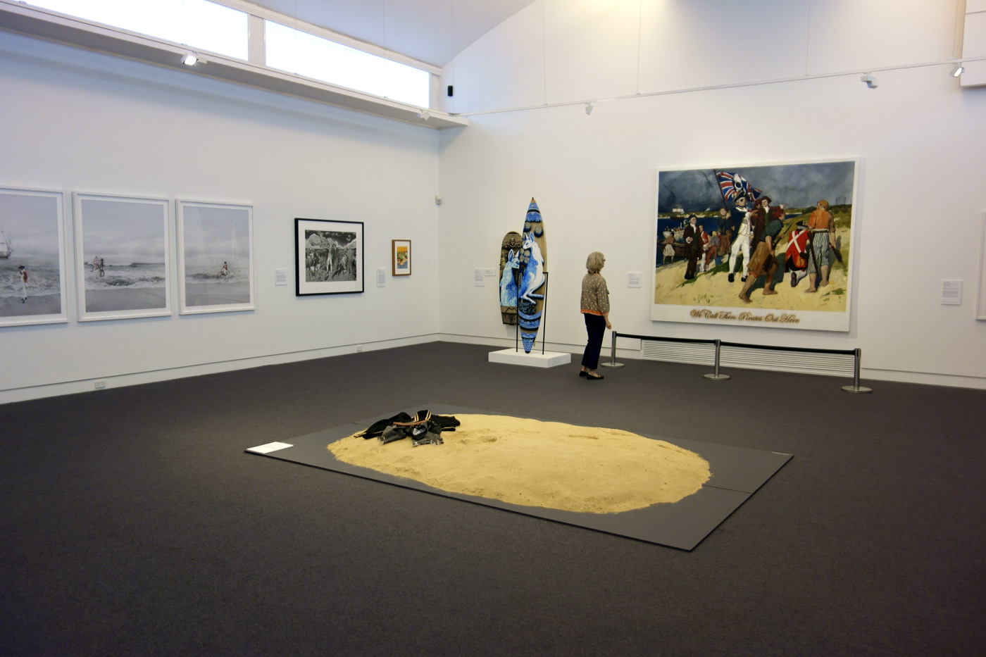 Installation view of the exhibition 'On the beach' at the Mornington Peninsula Regional Art Gallery with in the foreground, Leanne Tobin's 'Clothes don't always maketh the man' (2012), and in the background left, photographs from Michael Cook's 'Undiscovered' series (2010) Installation view of the exhibition 'On the beach' at the Mornington Peninsula Regional Art Gallery with in the foreground, Leanne Tobin's 'Clothes don't always maketh the man' (2012), and in the background left, photographs from Michael Cook's 'Undiscovered' series (2010)