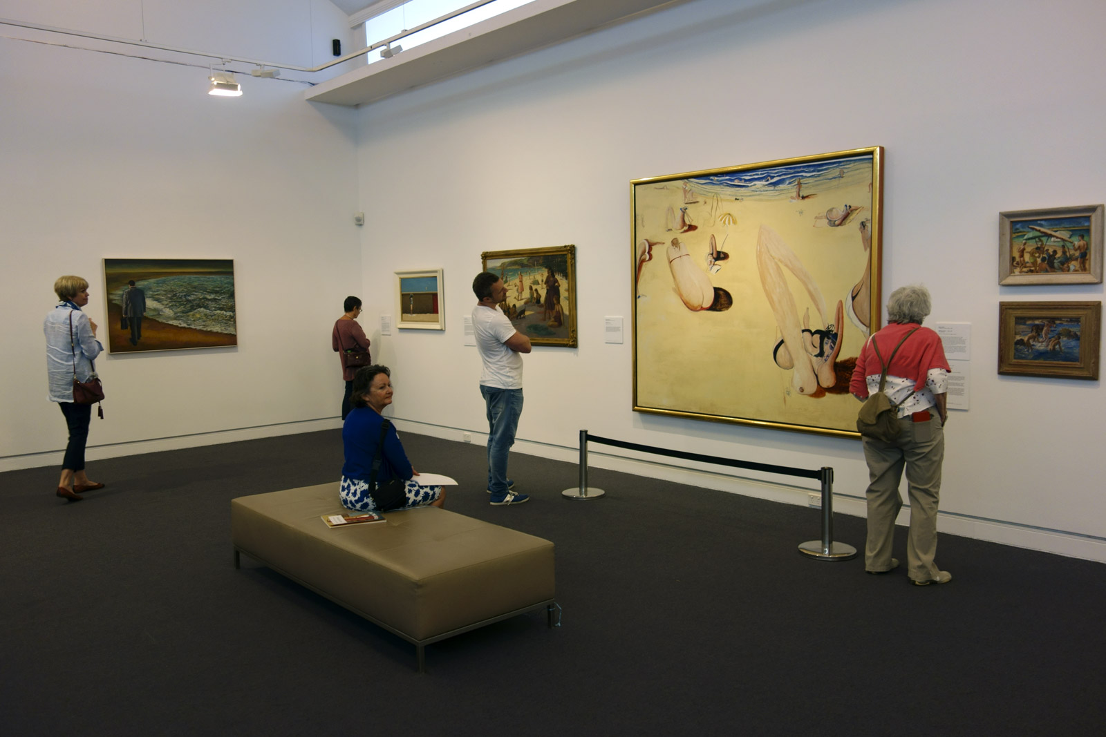 Installation view of the exhibition 'On the beach' at the Mornington Peninsula Regional Art Gallery showing in the centre, Brett Whiteley's 'Balmoral' (1975-1978). To the left of this painting is Nancy Kilgour's 'Figures on Manly Beach'Â (1930) and to the right Norma Bull's 'Bathing Beach' (c. 1950-1960s) with at bottom, George W. Lambert's 'Anzacs bathing in the sea'Â (1915) Installation view of the exhibition 'On the beach' at the Mornington Peninsula Regional Art Gallery showing in the centre, Brett Whiteley's 'Balmoral' (1975-1978). To the left of this painting is Nancy Kilgour's 'Figures on Manly Beach'Â (1930) and to the right Norma Bull's 'Bathing Beach' (c. 1950-1960s) with at bottom, George W. Lambert's 'Anzacs bathing in the sea'Â (1915)
