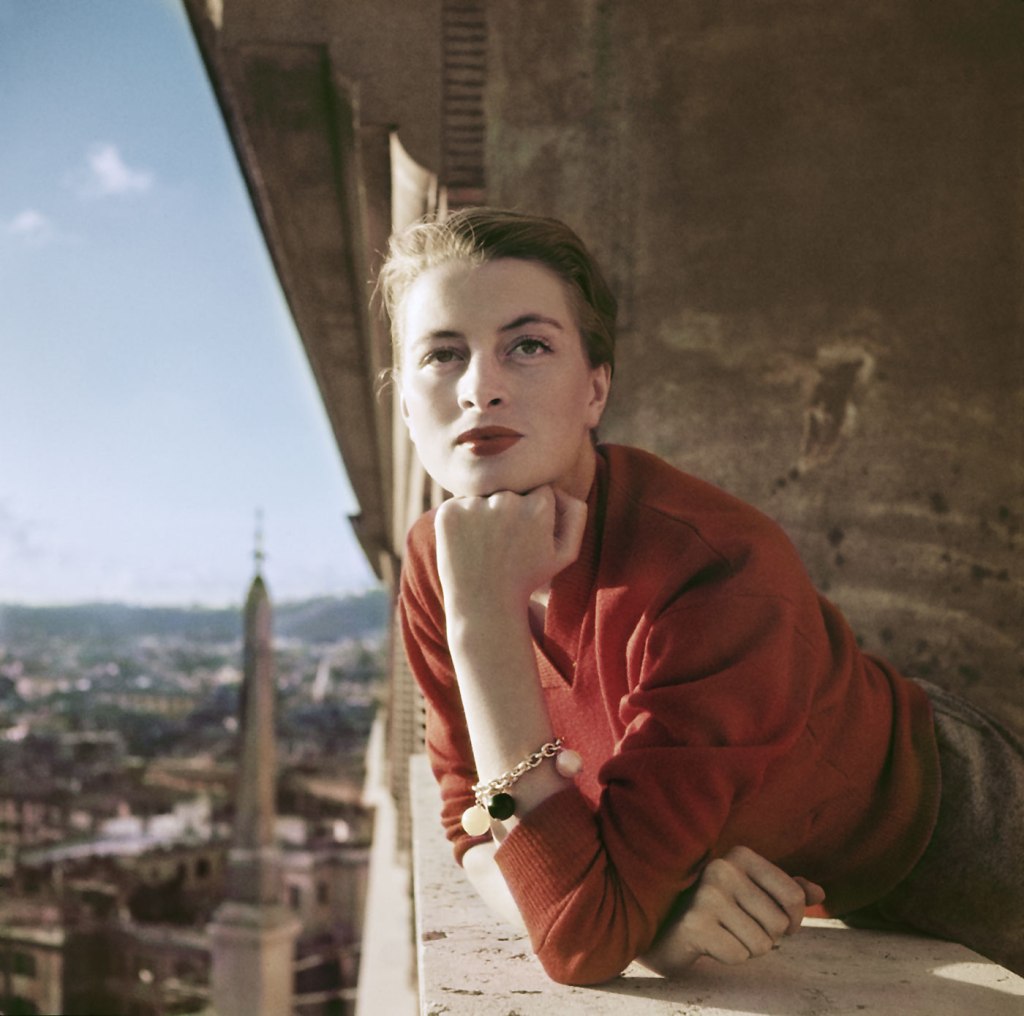 Robert Capa (American, 1913-1954) 'Capucine, French model and actress, on a balcony, Rome, Italy' August 1951