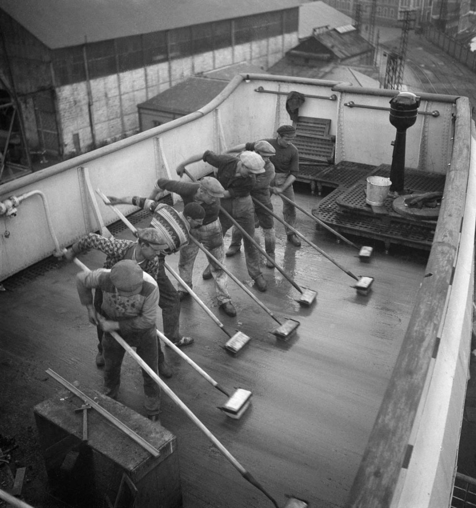 François Kollar (French born Slovakia, 1904-1979) 'Dans le port, à bord. Champlain : grattage du pont' (In port, on board. Champlain: scraping the bridge. Company building sites and workshops of Saint Nazaire Penhoët) 1931