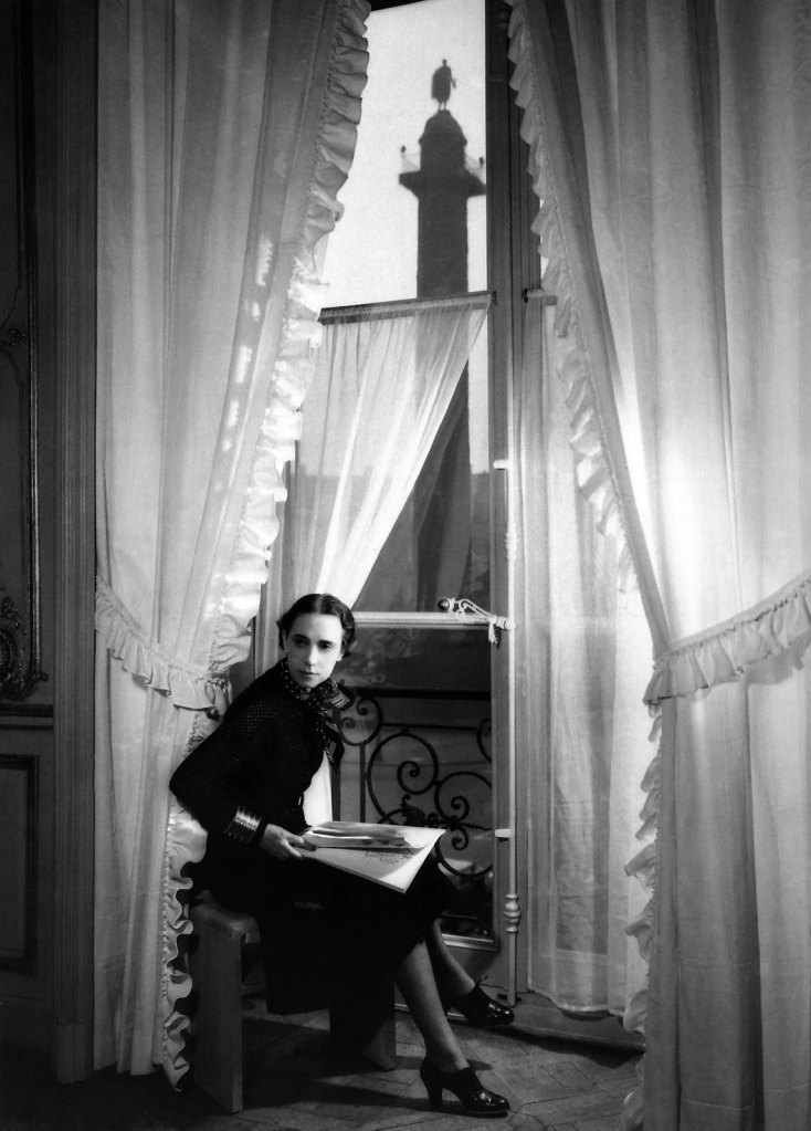 François Kollar (French born Slovakia, 1904-1979) 'Haute couturière Elsa Schiaparelli in a window of her showroom at 21 Place Vendôme in Paris' 1938