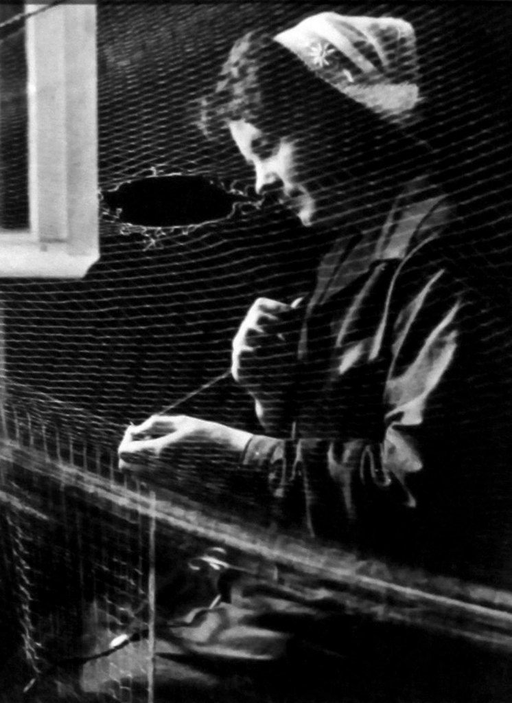 François Kollar (French born Slovakia, 1904-1979) 'Pêcheurs. Femme de pêcheurs, Sardinier Breton. Audiernes' (Fishermen. Woman fishing, sardine canner Breton. Audiernes) 1931