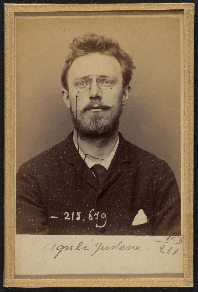 Alphonse Bertillon (French, 1853-1914) 'Olguéni Gustave. 24 ans, né à Sala (Suède) le 24-5-69. Artiste-peintre. Anarchiste. 14-3-94' 1894