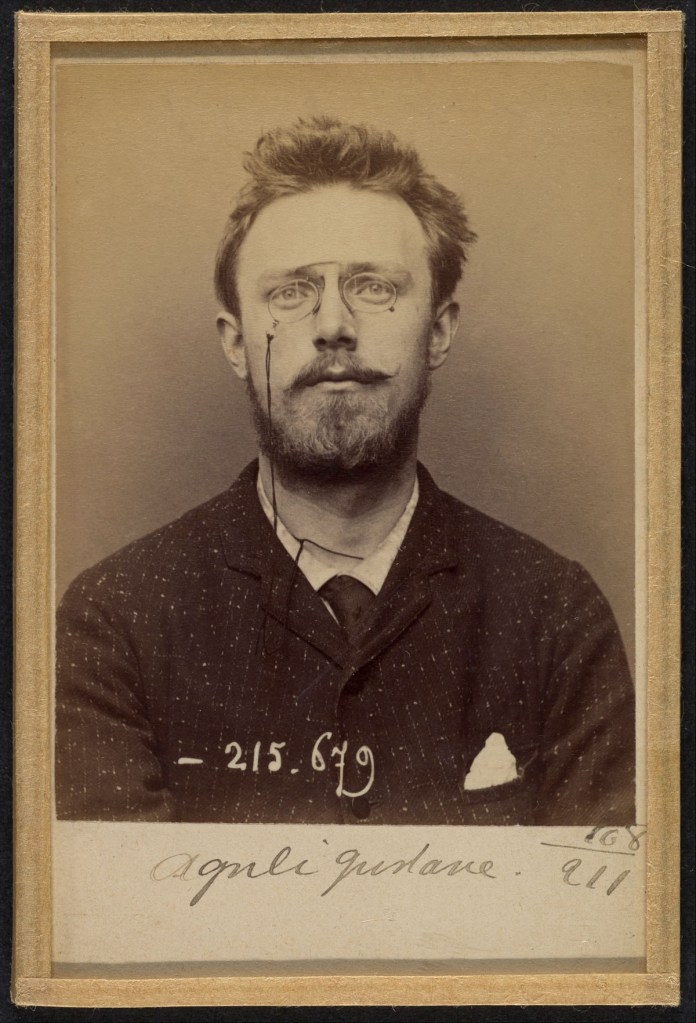 Alphonse Bertillon (French, 1853-1914) 'Olguéni Gustave. 24 ans, né à Sala (Suède) le 24-5-69. Artiste-peintre. Anarchiste. 14-3-94' 1894