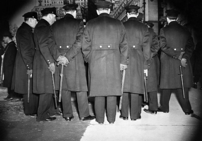 Weegee (Arthur Fellig) (American born Ukraine (Austria), Złoczów (Zolochiv) 1899 - 1968 New York) 'A Bunch of Cops' 1940s