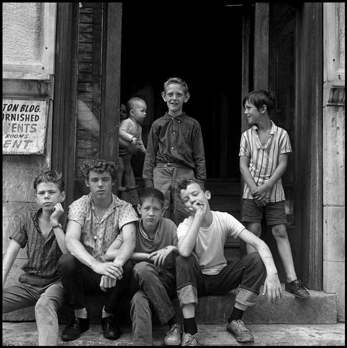 Danny Lyon (American, b. 1942) 'Children at an apartment entrance' 1965
