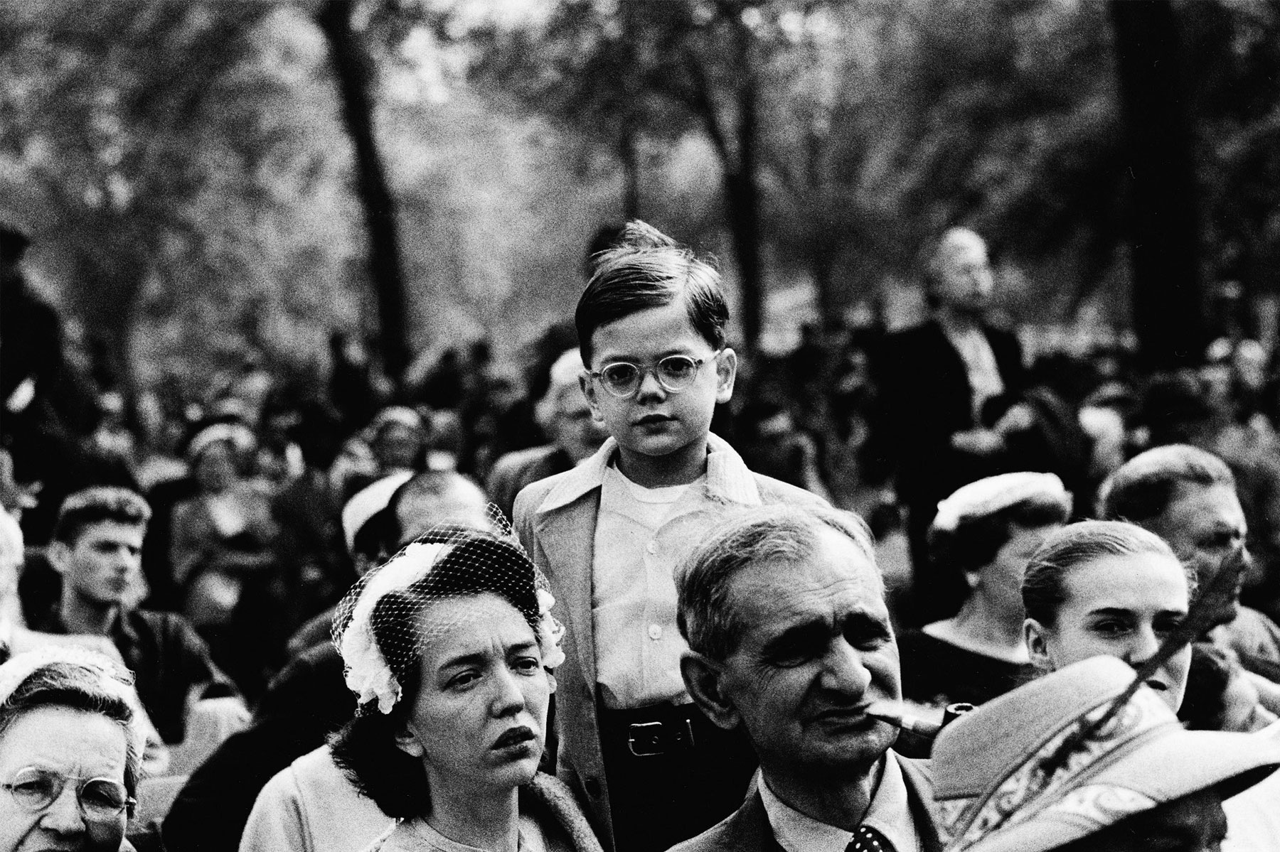 Diane Arbus (American, 1923-1971) 'Boy above a crowd, N.Y.C., 1957' 1957