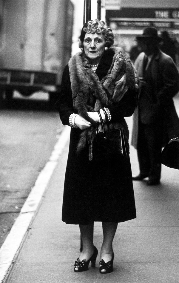 Diane Arbus (American, 1923-1971) 'Woman wearing a mink stole and bow shoes, N.Y.C., 1956' 1956