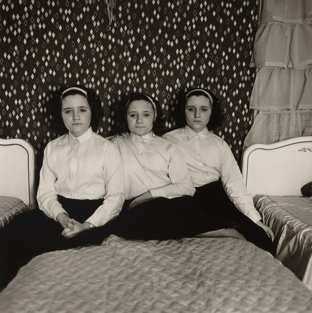 Diane Arbus (American, 1923-1971) 'Triplets in their Bedroom, N.J.,' 1963 Diane Arbus (American, 1923-1971) 'Triplets in their Bedroom, N.J.,' 1963