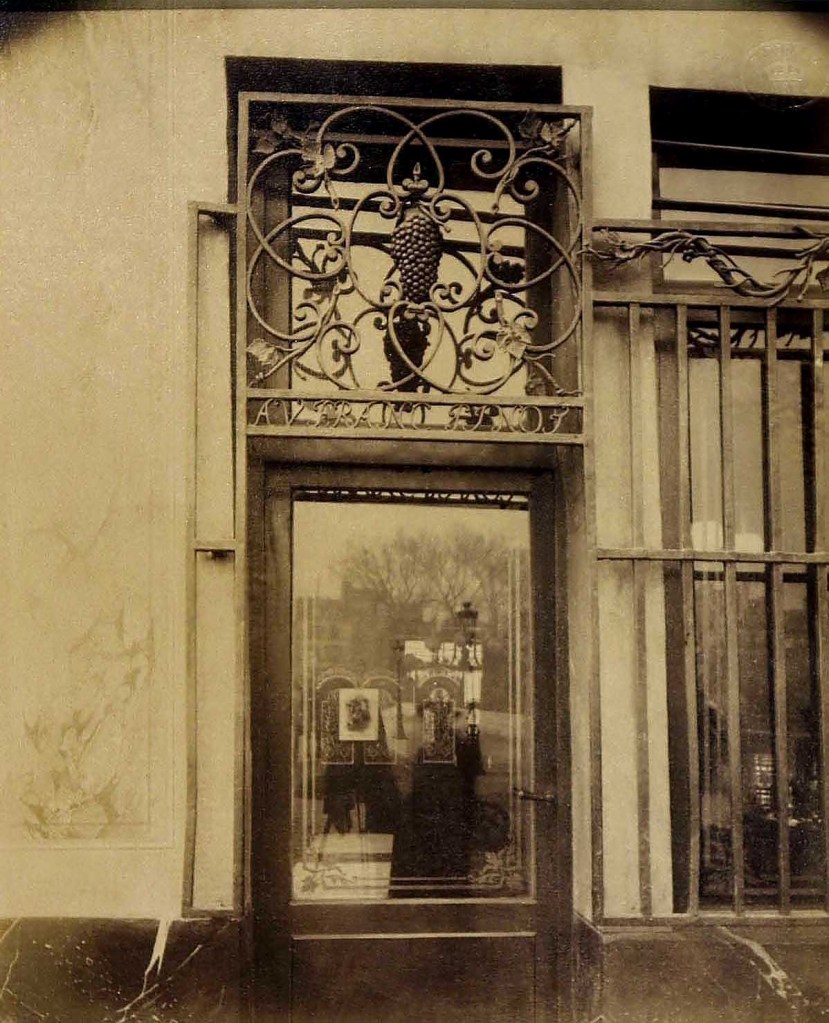 Eugène Atget (French, 1857-1927) 'Shopfront, Quai Bourbon, Paris, France' c. 1900