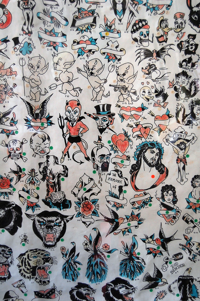 Tony D'Annessa (b. 1935) 'Window shade with flash designs from Tony D'Annessa's tattoo shop on W. 48th Street' c. 1962