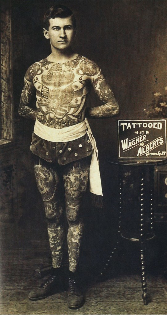 Unknown photographer. '"Painless" Jack Tyron tattooed by Charlie Wagner and Lewis (Lew) Alberts' Nd