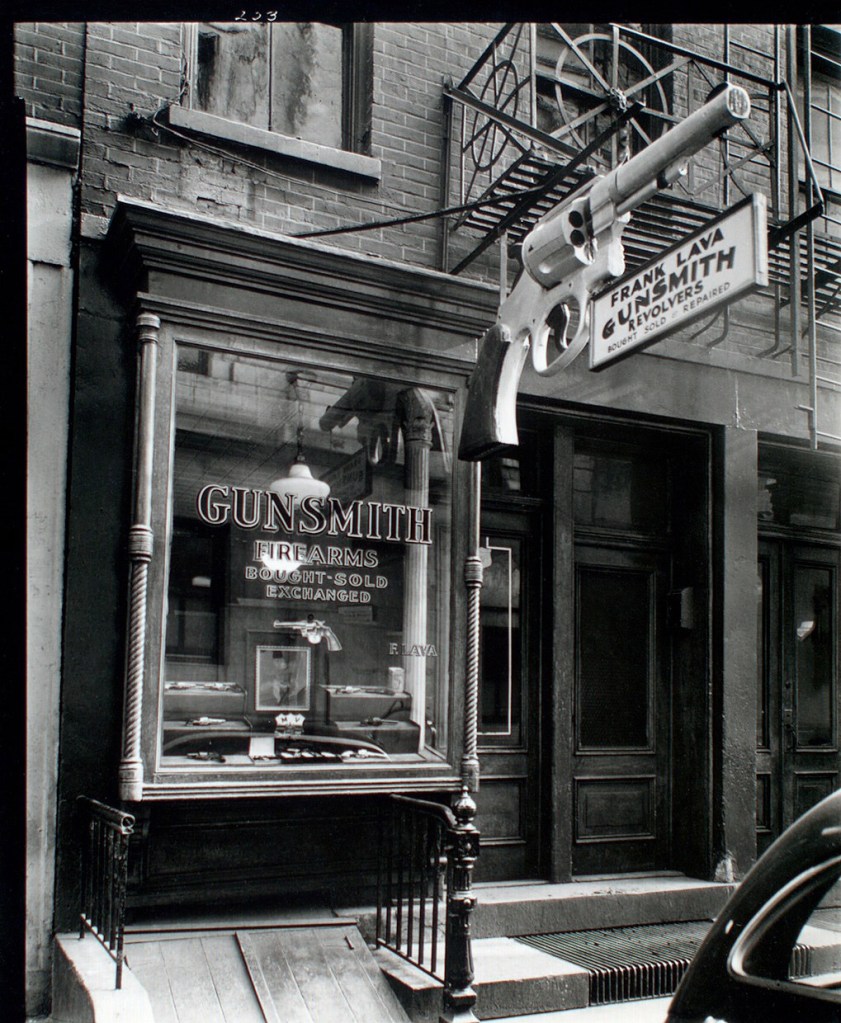 Berenice Abbott (American, 1898-1991) 'Gunsmith, 6 Centre Market Place, Manhattan' February 4, 1937