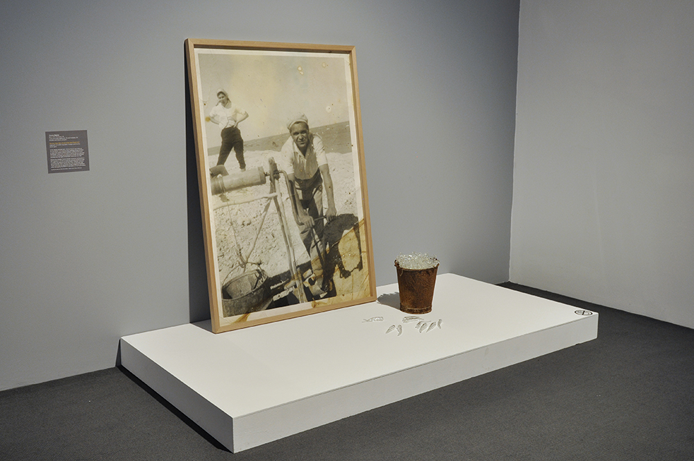 Installation view of the exhibition 'Under the sun Reimagining Max Dupain's 'Sunbaker'' at Monash Gallery of Art, Melbourne showing Yhonnie Scarce's 'Working Class Man (Andamooka Opal Fields)' (2017)