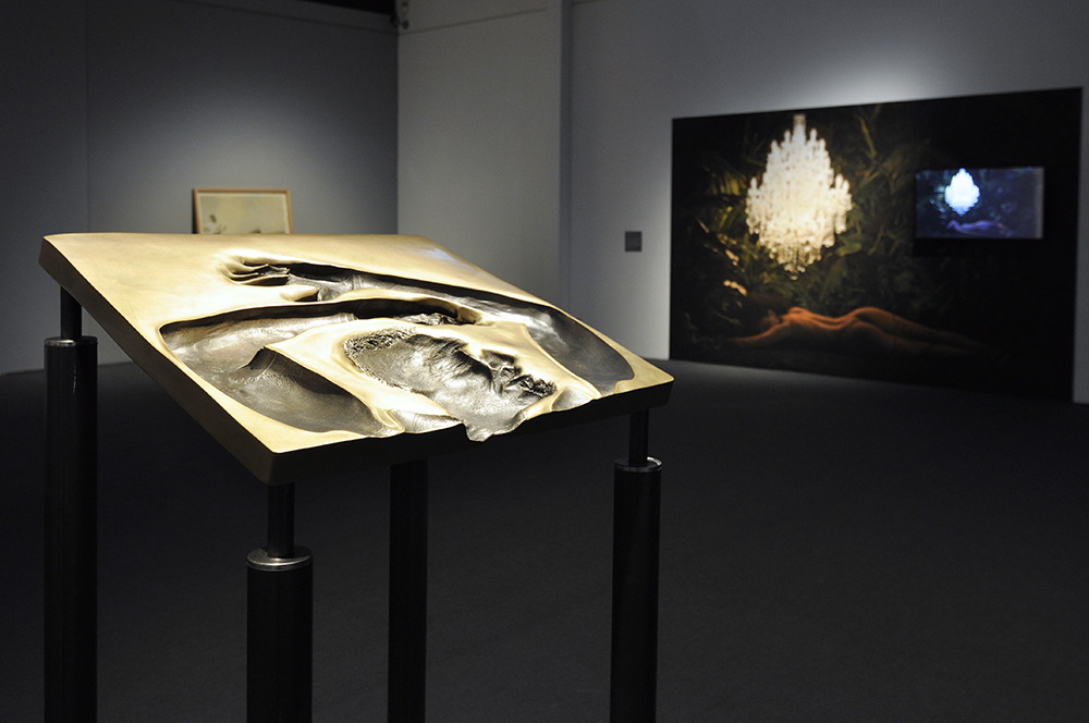 Installation view of the exhibition 'Under the sun Reimagining Max Dupain's 'Sunbaker'' at Monash Gallery of Art, Melbourne showing Julie Rrap's 'Speechless' (2017)