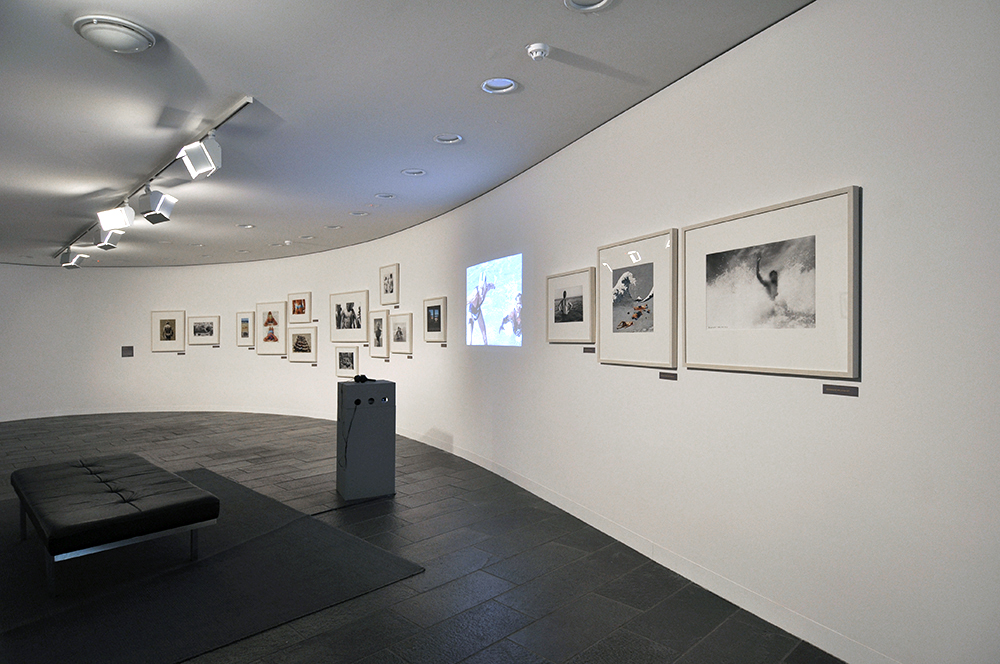 Installation view of the exhibition 'Under the sun Reimagining Max Dupain's 'Sunbaker'' at Monash Gallery of Art, Melbourne showing William Yang's 'SUMMER, A suite of images and My Time at South Bondi' (2017)