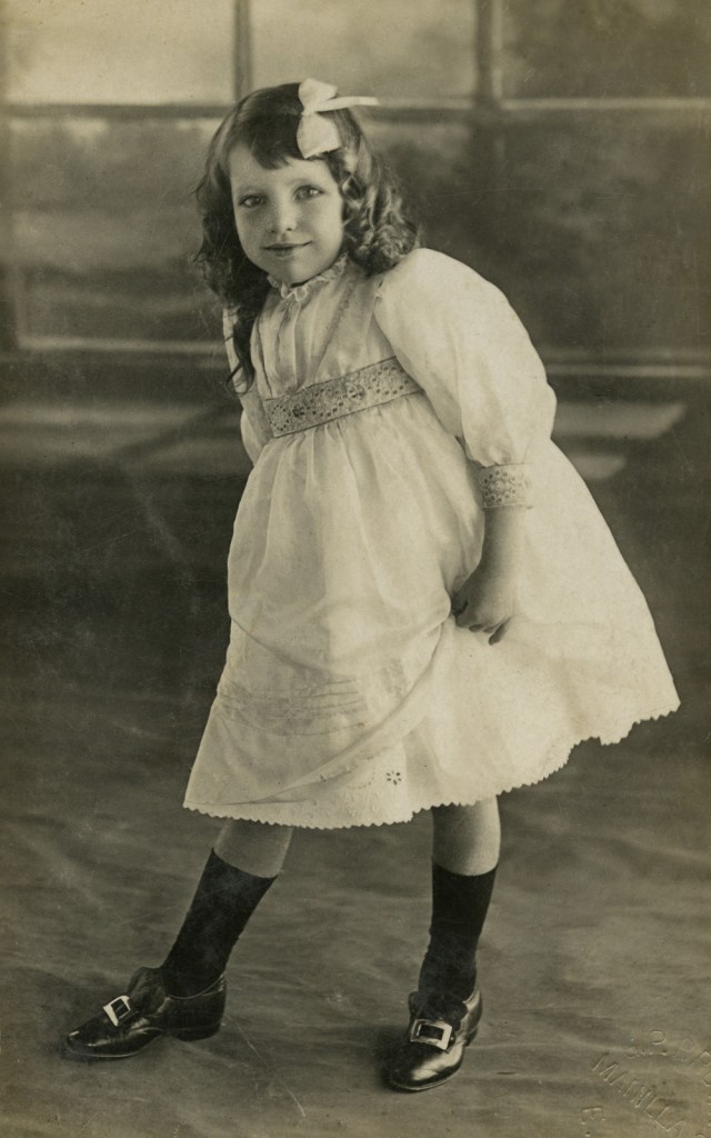 George Brown. 'Girl with fancy buckled shoes' 1912-1928