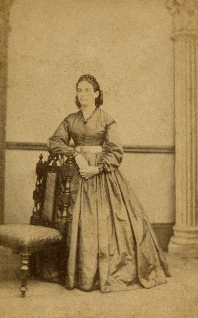 Daniel Marquis (Australian born Scotland, 1829-1879) 'The same woman in a crinoline dress posing with a chair' 1865-1870 from the exhibition Eton 'Sit. Pose. Snap. Brisbane Portrait Photography 1850-1950' at the Museum of Brisbane, March - July, 2017