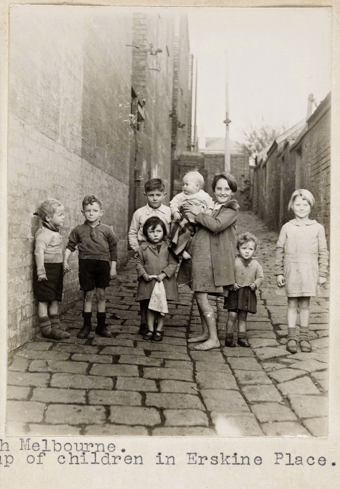 F. Oswald Barnett (Australian, 1883-1972) 'North Melbourne. Group of children in Erskine Place'